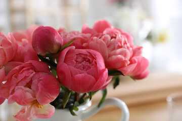 Beautiful peony bouquet on blurred background, closeup