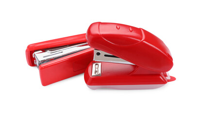 Two new bright staplers isolated on white