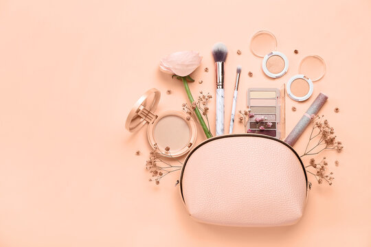Composition with bag, makeup cosmetics and flowers on nude background. Banner for design
