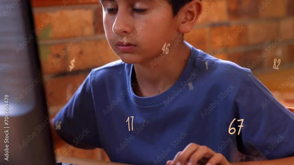 Poster animation of numbers over biracial schoolboy using computer at school