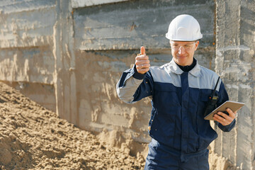 Control quality of sand on quarry industrial open pit mine or cement plant. Engineer of industry...