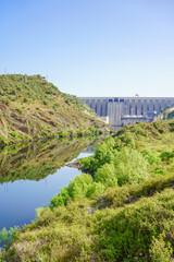 Vertical view of river Tajo and Jose María Oriol dam in Alcántara, Extremadura, Spain 