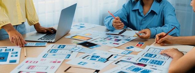 Panorama banner of startup company employee planning on user interface prototype for mobile...