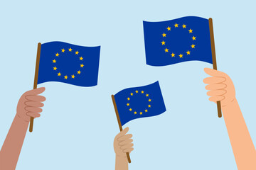WebDiverse hands raising flags of the European Union. Vector illustration of the EU flags in flat style on blue background.
