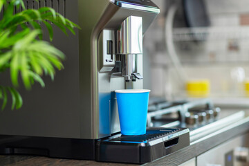 Modern Coffee Machine Pouring Drink in Cup