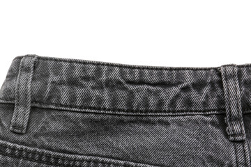 Stylish black denim jeans on white background