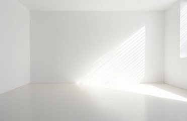 Fototapeta premium a white wall is facing some light