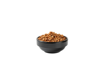 Raw buckwheat in a bowl isolated on a white background. Wheat grains, porridge, cereals, raw buckwheat in a plate. Healthy food. Porridge. Diet. Organic cerea