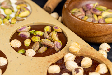 making homemade chocolate with different ingredients
