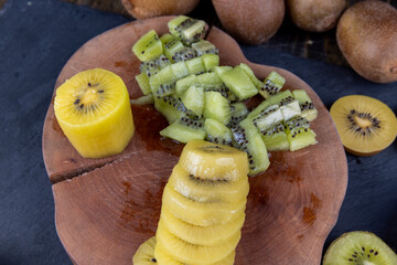 yellow green kiwi with dark seeds, delicious kiwi