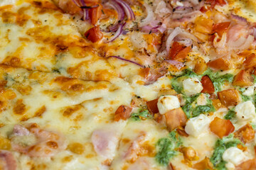 pizza using a large number of different ingredients close-up