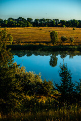 Lake in the morning . Fog on the lake at morning . Sunrise over the forest with fog . Summer vibes...