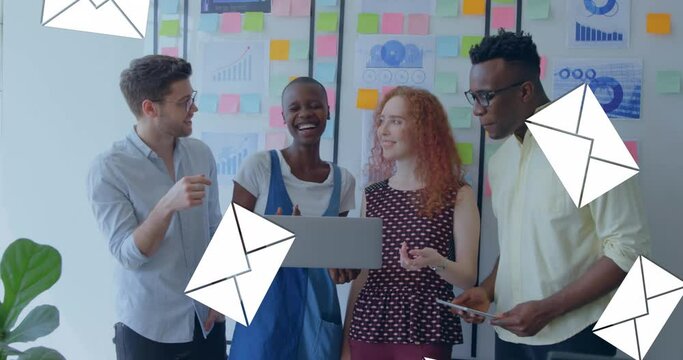 Animation of message icons faling against team of diverse colleagues smiling together at office