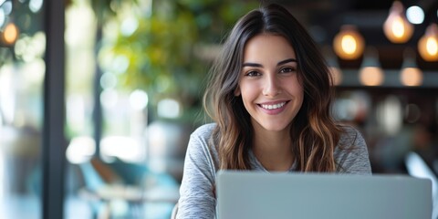 business woman in the office using a laptop Generative AI - obrazy, fototapety, plakaty