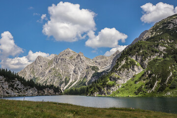 Sunny Rocky Peak with Tappenkarsee in Austria. Mountain Landscape in Kleinarl. Picturesque Nature in European Summer.