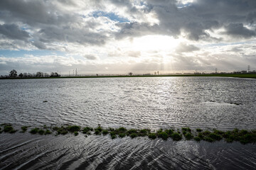Hochwasser - überflutete Felder nach Dauerregen, Symbolfoto.