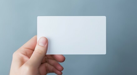 Fototapeta premium hand holding blank business card