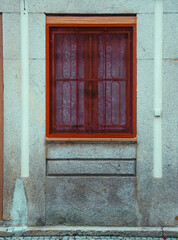 Details of European city architecture, such as windows, doors, walls, electrical wires, signs and tiles. Ordinary elements of urban life in bright colours and high contrast. 