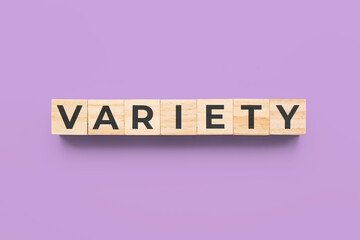 variety wooden cubes on purple background