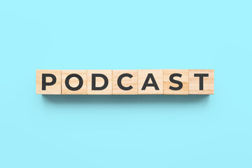 podcast wooden cubes on blue background
