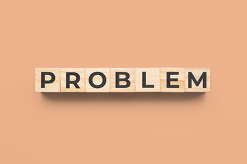 problem wooden cubes on orange background