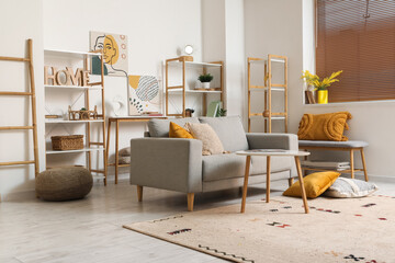 Interior of cozy living room with sofa and shelf units