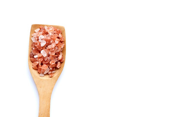 Pink himalayan salt on white.