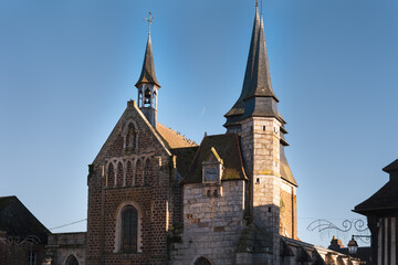 Fototapeta na wymiar St Martin church in Broglie, Eure, with its facade in 