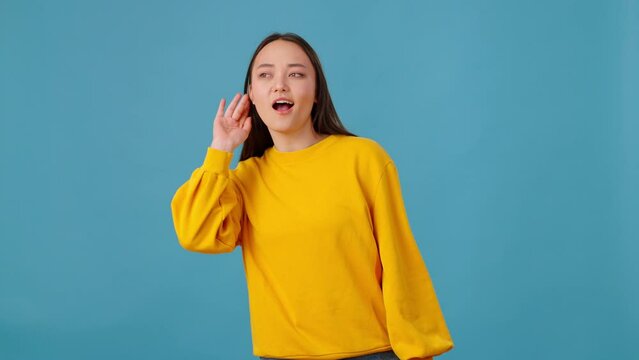 Lady eavesdropping on conversation with mouth at lock