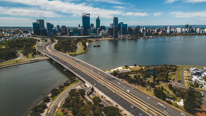 Aerial view from South Perth and the Mitchell Freeway or Narrows Bridge with Perth city in the background - Western Australia  - obrazy, fototapety, plakaty