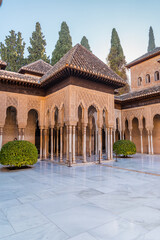 Fototapeta na wymiar Moorish architecture and Nasrid art in the Court of the Lions of the Alhambra in Granada, Spain