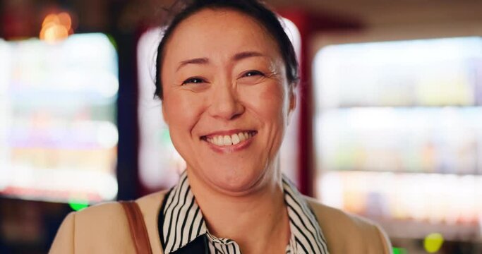 Japanese, woman and face with laughing in city for comedy, joke or funny story with travel to workplace. Mature person, portrait or happy with comic news, meme or humor for commute or morning journey