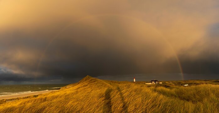 Dune Landscape with Rainbow and List-ost Lighthouse, Ellenbogen, List, Sylt Island, Germany, Europe
