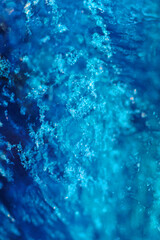 Fototapeta na wymiar artfully frozen from Blue water and ice