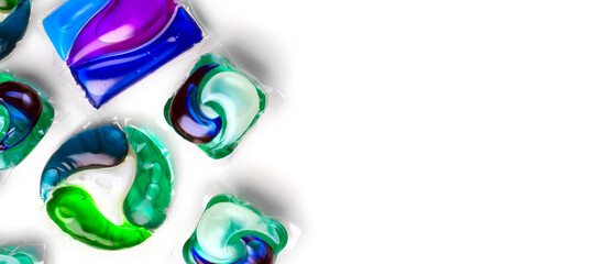 Washing capsules, colorful laundry pods border design. Colorful Soluble capsules with laundry gel detergent and dishwasher soap. Pile of washing pod capsules isolated. Detergent tablets. Top View