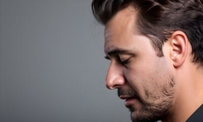 portrait of a man close-up to depressed, feeling sad