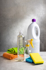 Cleaning products. Sponge, detergent, disinfectant, spray bottle and cloth for household cleaning.