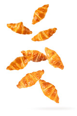 Croissant falling in the air isolated on white background
