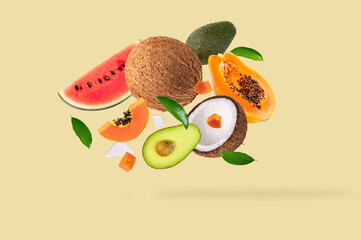 Falling various healthy vegetables and fruits on  light yellow background. - 706766072
