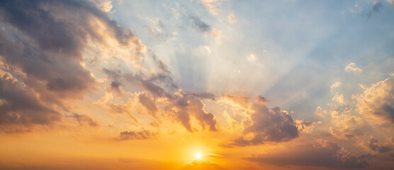 Naklejka na ściany i meble Panoramic beautiful sunset sky with clouds.