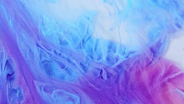 Fluid art drawing footage showcasing an abstract acrylic texture with a flowing effect. The video presents an artistic background motion with overflowing colors in shades of purple, blue, and white.