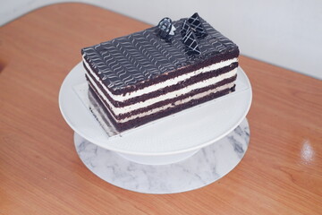 Delicious chocolate cake on a white plate