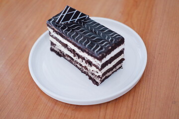 Delicious chocolate cake on a white plate