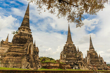 Fototapeta premium From below of ancient Wat Phra Si Sanphet Buddhist temple in Ayutthaya, Thailand