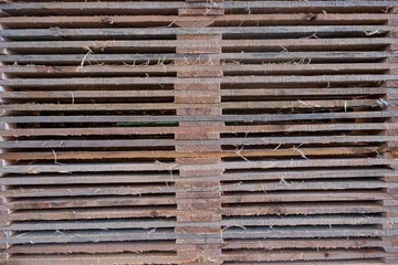 Lines of wood with textures, mountain pallets in light and dark brown tones