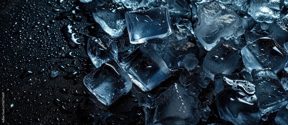 Poster pieces of crushed ice cubes on black background empty space in the center in form of a bottle. with 