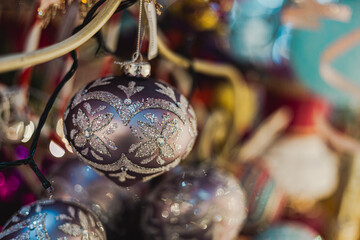 Sliver christmas balls on a tree, shiny Xmas decoration