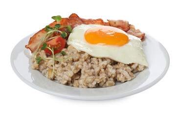 Tasty boiled oatmeal with fried egg, bacon and tomato isolated on white