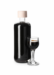 Bottle and glass with coffee liqueur isolated on white