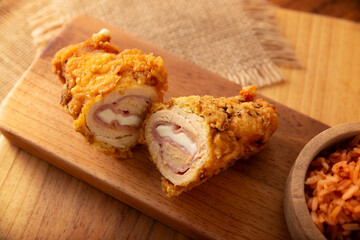 Chicken Cordon Bleu. Chicken breast meat wrapped with ham and cheese, breaded and fried or baked....